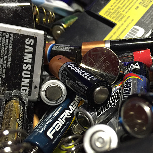 image with different types and brands of old batteries