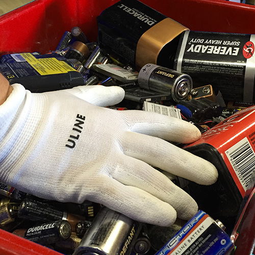 image of old batteries being weighting