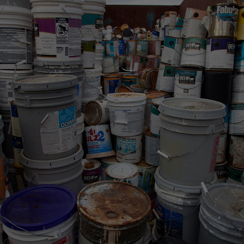 image of different types of container with old/unused paint or oil