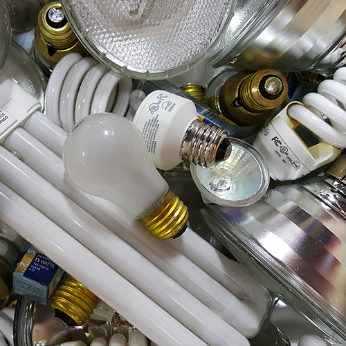 image of mixed lamps, batteries, light bulbs